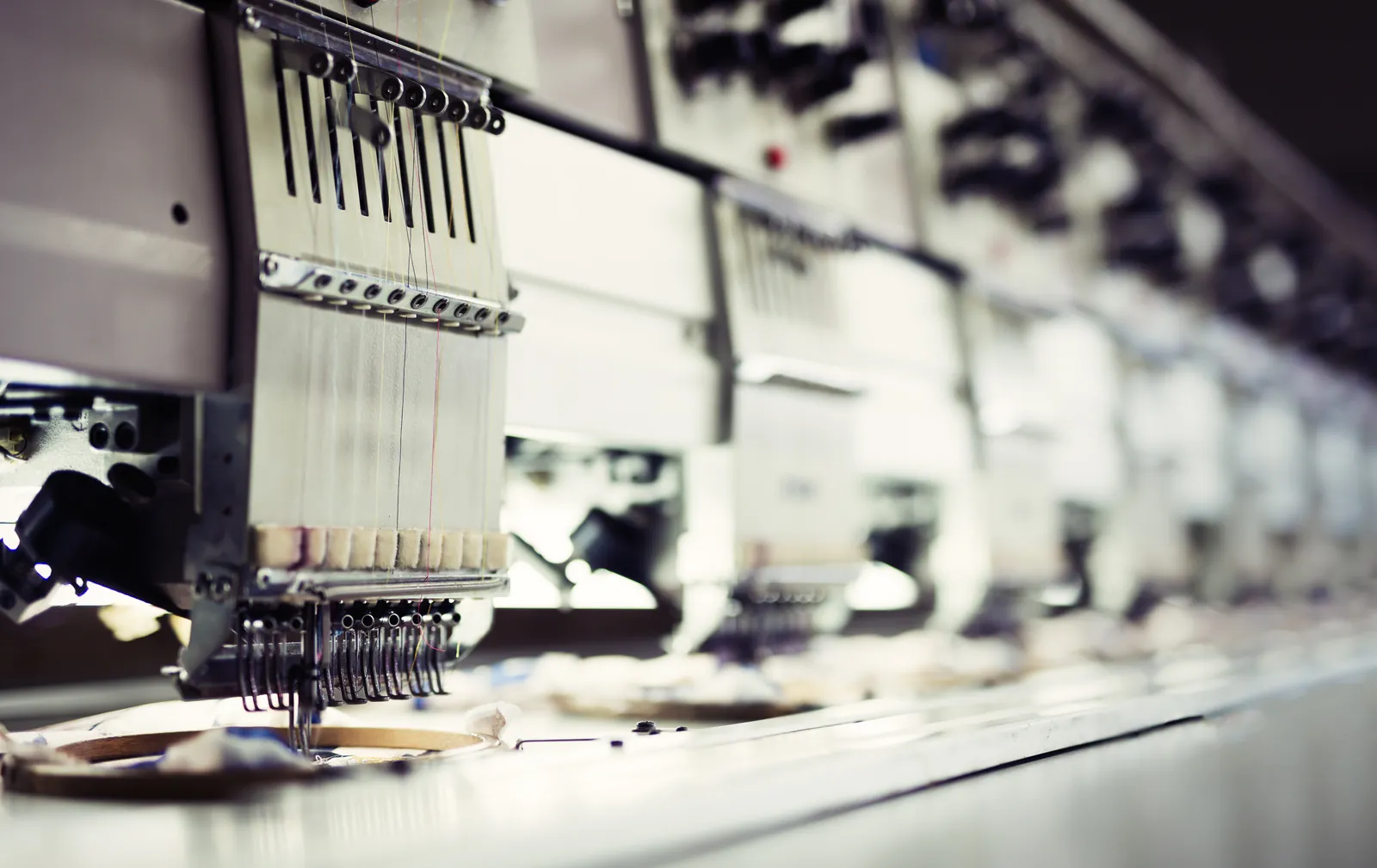 Multi-head embroidery machines running in production
